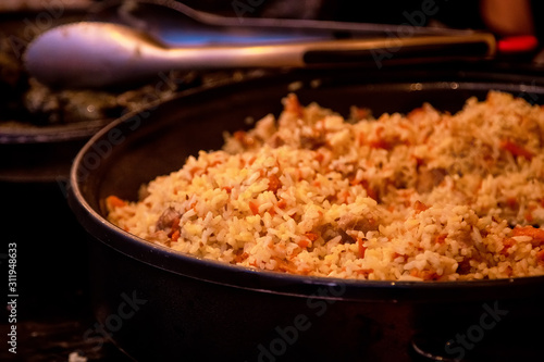 large pan with rice and meat