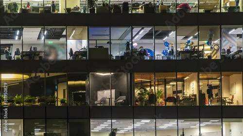 Сreative office workers during operation and at the end of working day, time lapse