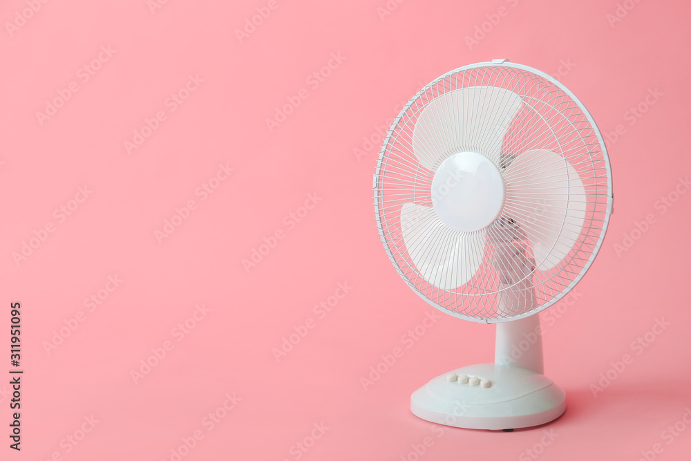 Electric fan on color background Electric fan on color background