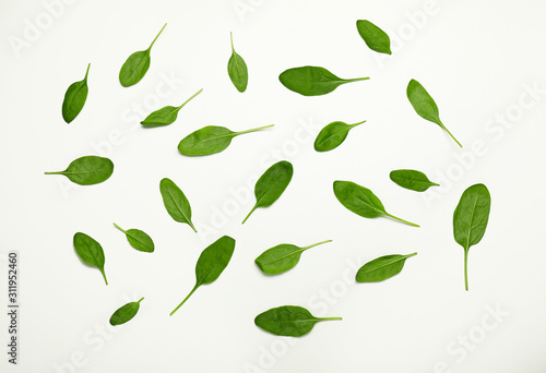 Fresh spinach on white background