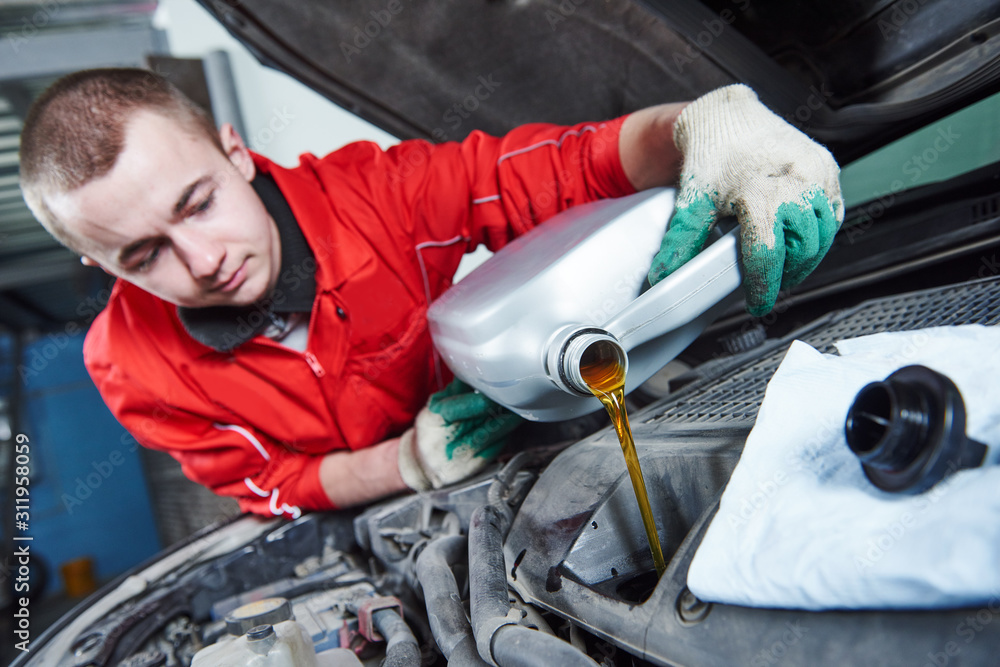 Fototapeta premium automobile car oil replacement work