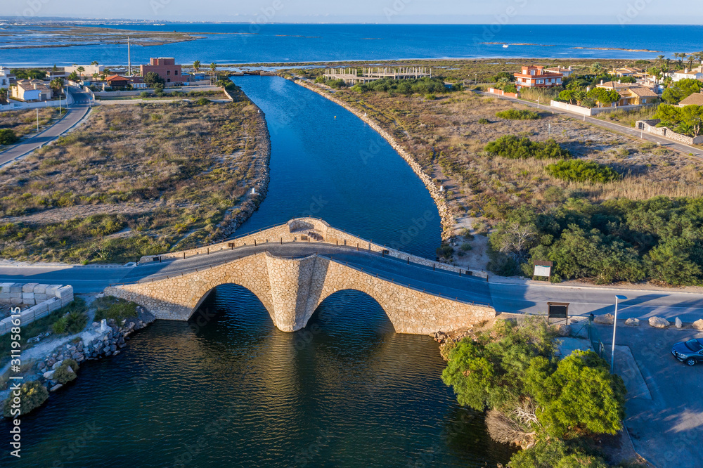 Fototapeta premium Aerial view of the Stone Bridge on the spit of La Manga. Spain