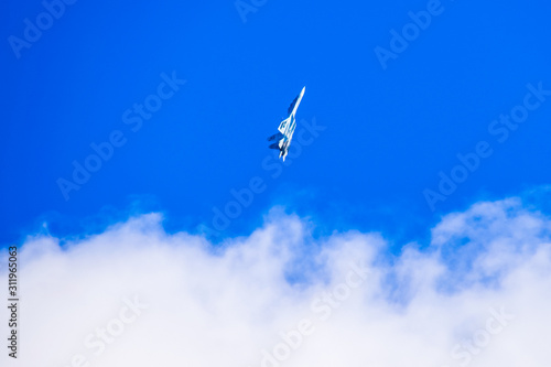 fighter flying in the sky. Military aircraft of the 4th generati