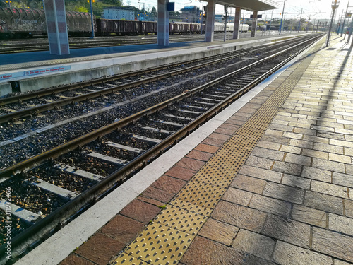 Train tracks perspective view photo