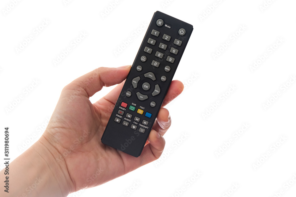 His hand is holding the remote control and operate the remote control. on the White Background . Concept of Technology His hand is holding the remote control and operate the remote control. on the White Background . Concept of Technology