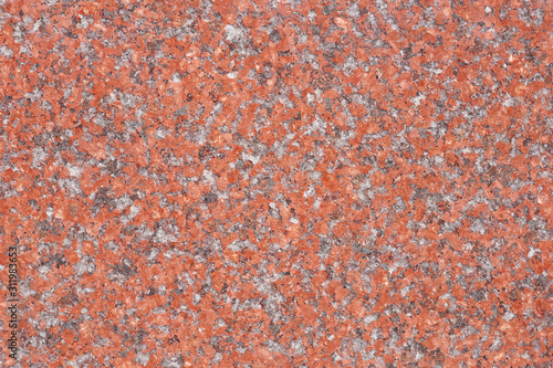 Seamless red granite surface texture background photo