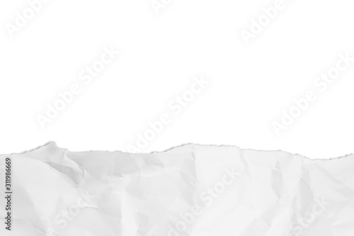White crumpled paper texture background. Ripped paper isolated on white background with copy space. © Ekkachai