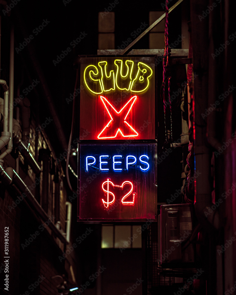 Fotka „Melbourne, Victoria, Australia, June 5th 2019 The grimy and weathered neon signs for a