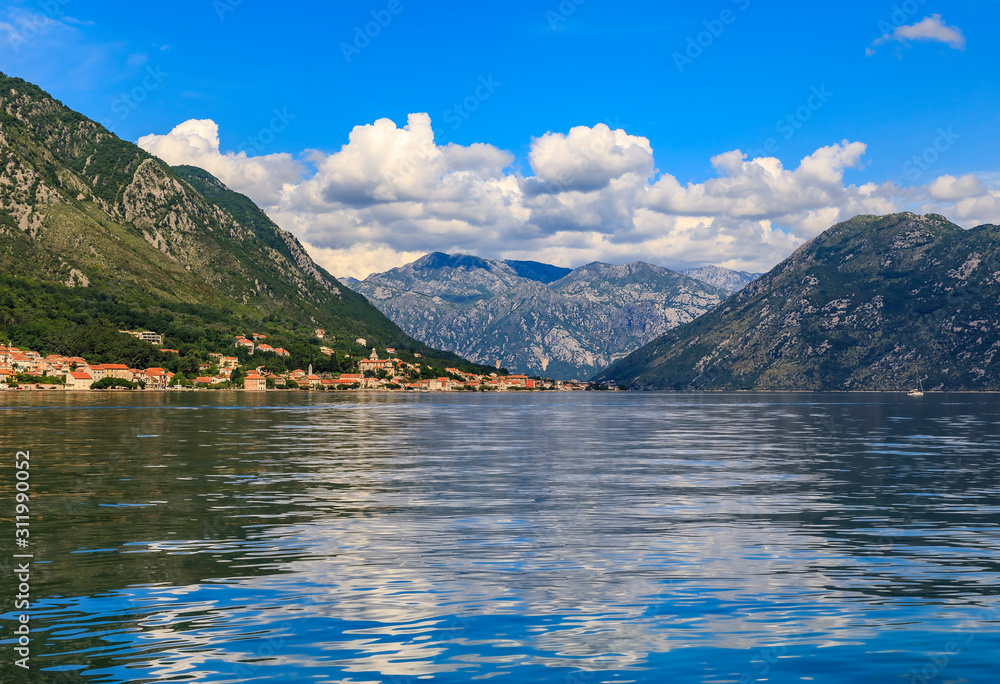 Scenic landscape of Kotor Bay with mountains and crystal clear water in the Balkans, Montenegro on the Adriatic Sea