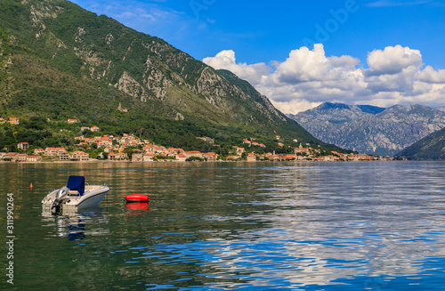 Scenic landscape of Kotor Bay with mountains and crystal clear water in the Balkans, Montenegro on the Adriatic Sea