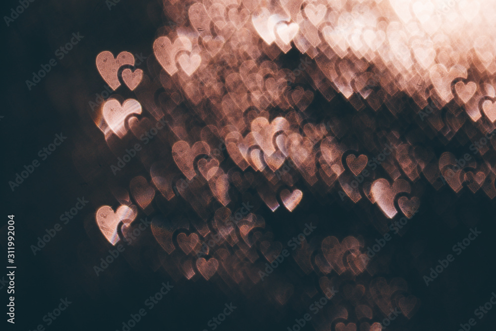Fototapeta Blurred bokeh with hearts bokeh style. copy space for adding your text or use for background.