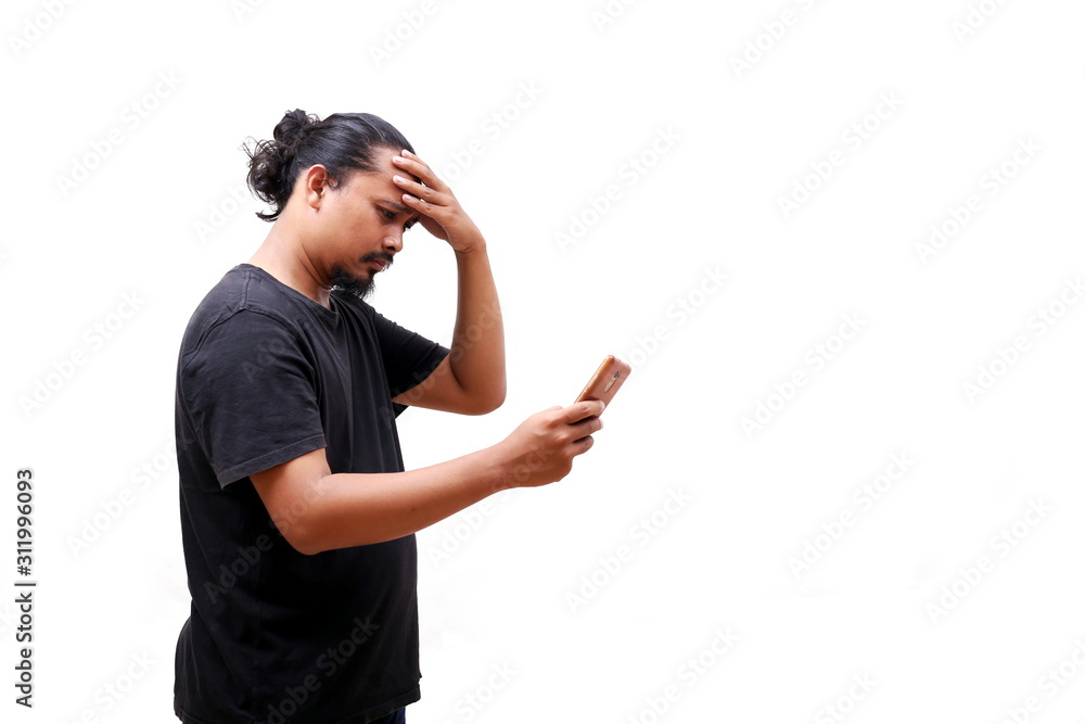 asian man holding smartphone with headache or stress gesture asian man holding smartphone with headache or stress gesture