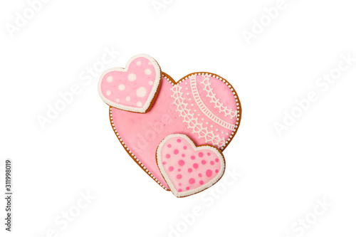 Background from pink cookies heart shaped with different patterns  isolated