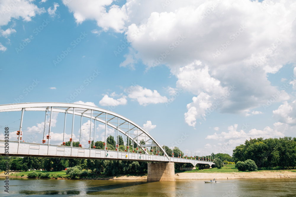 Belvarosi Hid bridge and Tisza River in Szeged, Hungary Belvarosi Hid bridge and Tisza River in Szeged, Hungary