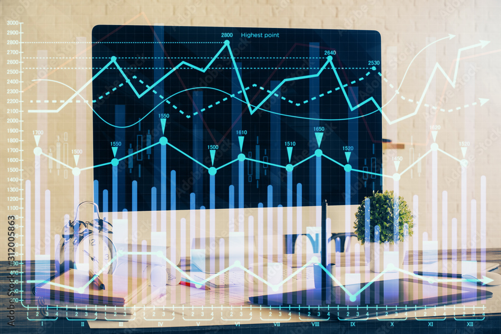 Financial market graph hologram and personal computer on background. Multi exposure. Concept of forex. Financial market graph hologram and personal computer on background. Multi exposure. Concept of forex.