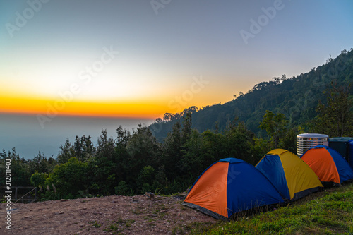 sunrise above camping on the top of mountain of Khun Sathan Nation Park Nan province Thailand.