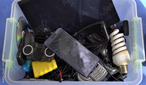 E-waste. Rapid technology change, planned obsolescence have resulted in surplus, which contributes to the increasing amount of hazardous electronic waste around the globe