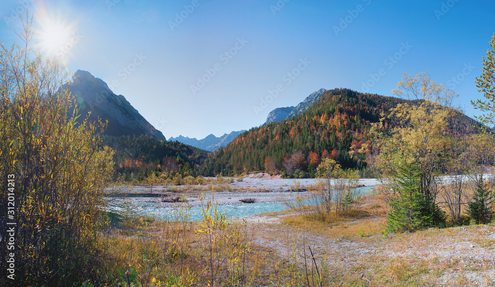 beautiful autumnal landscape in Hinterriss, karwendel mountains and colorful alpine forest, Rissbach valley
