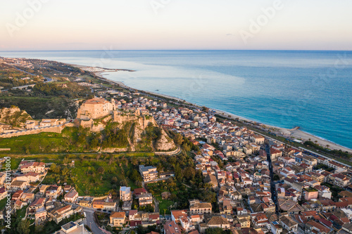 Roccella Jonica, vista aerea della città calabrese con il mare, la spiaggia e il castello. photo