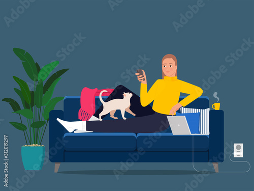 A girl on the sofa with a smartphone and a cat on her lap and a laptop on the sofa.