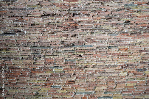 Ancient Rough Textured Wall with Worn & Weathered Bricks 