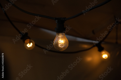 Wallpaper Mural Light bulbs in the ceiling of a tent Torontodigital.ca