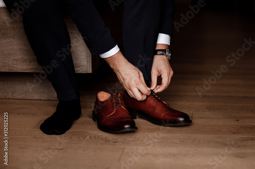Business man or groom wearing classic elegant shoes.