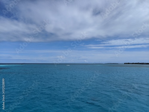 Serene Image of the vast ocean in the Maldives.  © Ginja