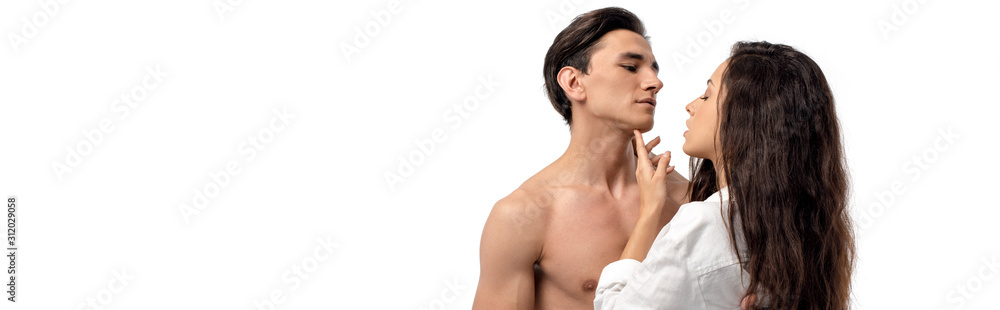 panoramic shot of beautiful sexy couple of lovers hugging, isolated on white