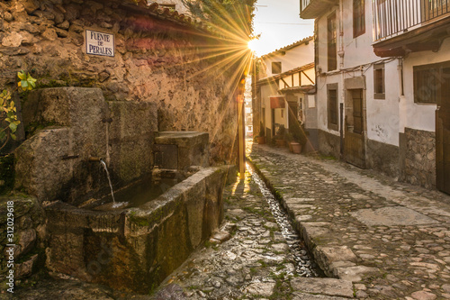 A typical fountain of the town of Candelario (Salamanca, Spain) photo