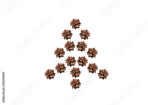 Creative layout of Christmas tree made of fir cones on white background. Nature New Year concept