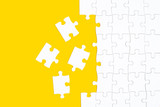 White details of puzzle on yellow background
