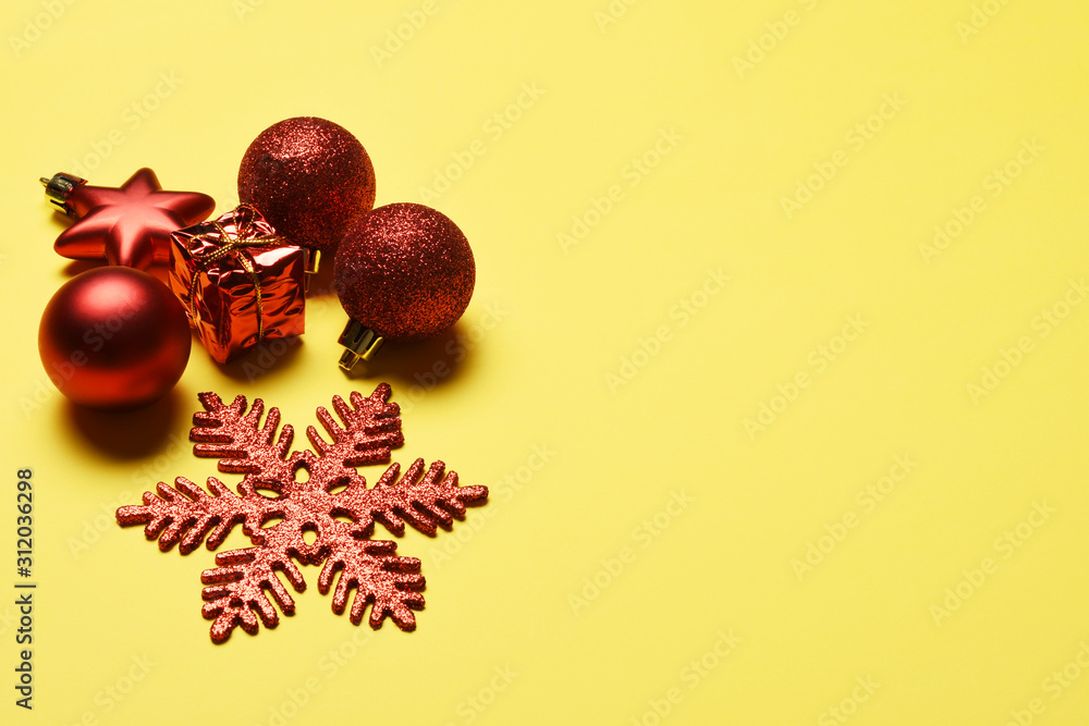 Christmas decoration on the yellow background with copy space Christmas decoration on the yellow background with copy space