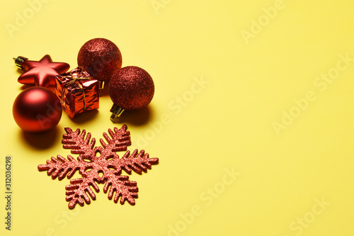 Christmas decoration on the yellow background with copy space