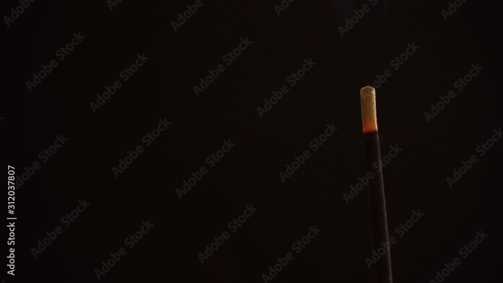 Incense stick are burning and smoke on black background,Smoke from incense. Incense stick are burning and smoke on black background,Smoke from incense.