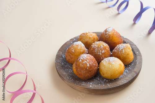 Konstfotografi Carnival italian fritters in carnival on brown background