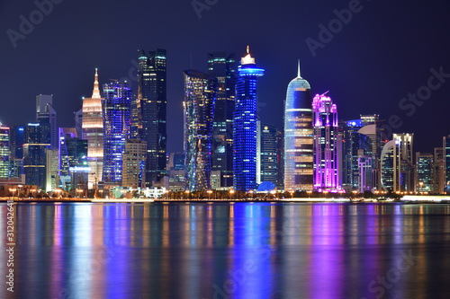 West Bay panorama at night from the Gulf in Qatar, Doha © olgavolodina