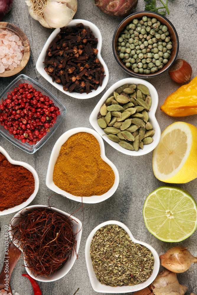 Spices and herbs on table. Food and cuisine ingredients and lemon Spices and herbs on table. Food and cuisine ingredients and lemon