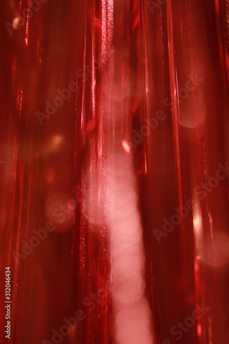 red ribbons curtain closeup for background
