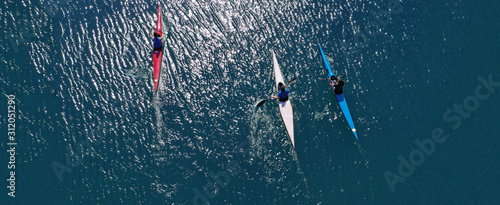 Billede på lærred Aerial drone ultra wide photo of sport canoes competing in open ocean sea