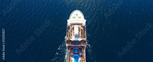Aerial drone ultra wide photo of huge cruise liner in Mediterranean blue sea