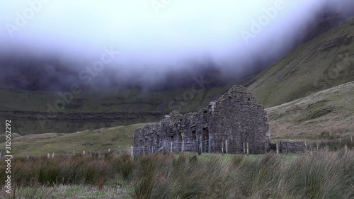 The derelict old school at Gleniff Horseshoe in County Sligo - Ireland photo