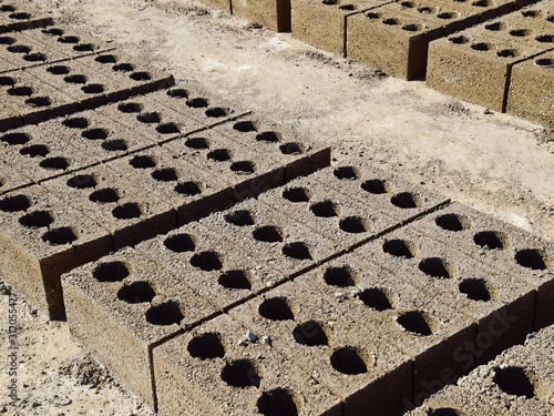 Cinder blocks lie on the ground and dried. on cinder block produ photo