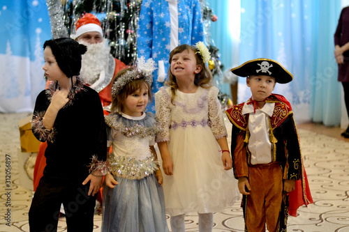  Pupils of the middle group at the new year's holiday in kindergarden 