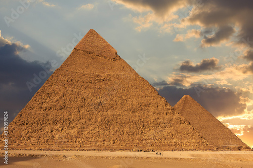 Famous great Giza Pyramids in sand desert in Cairo.	