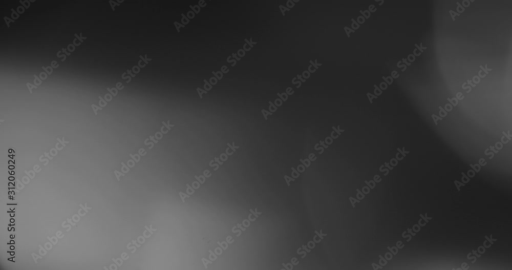 Abstract bokeh light background for overlay. Real Lens flare light effect. Sparkle ray leak on black background. Abstract bokeh light background for overlay. Real Lens flare light effect. Sparkle ray leak on black background.