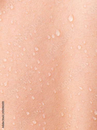 drops of water on human skin 