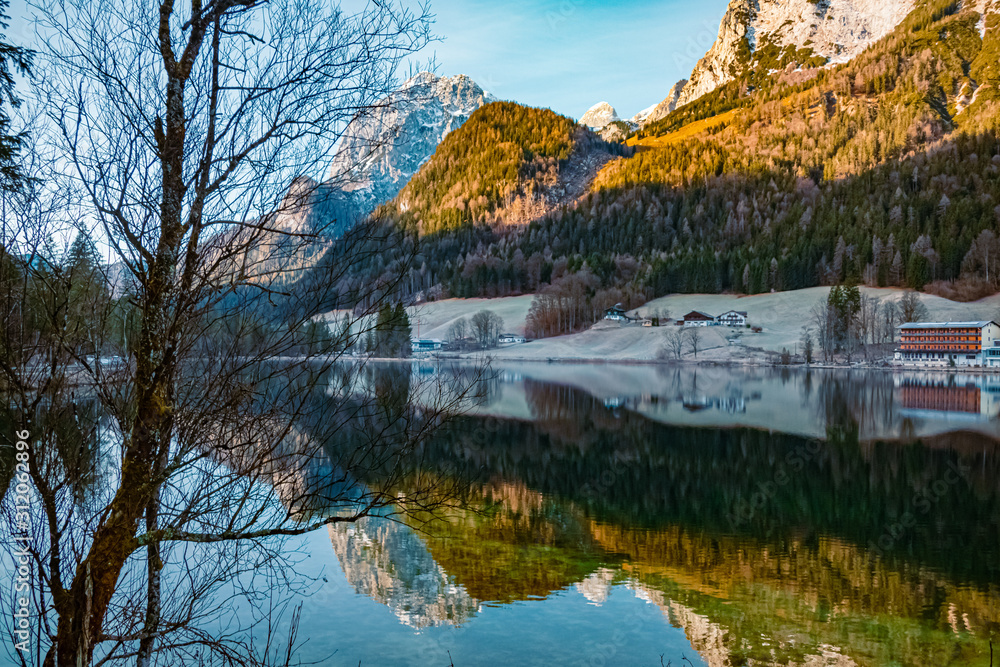Beautiful alpine view with reflections at the famous Hintersee, Ramsau, Berchtesgaden, Bavaria, Germany