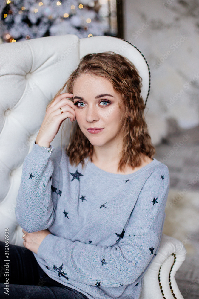 Beautiful woman at Christmas tree Beautiful woman at Christmas tree