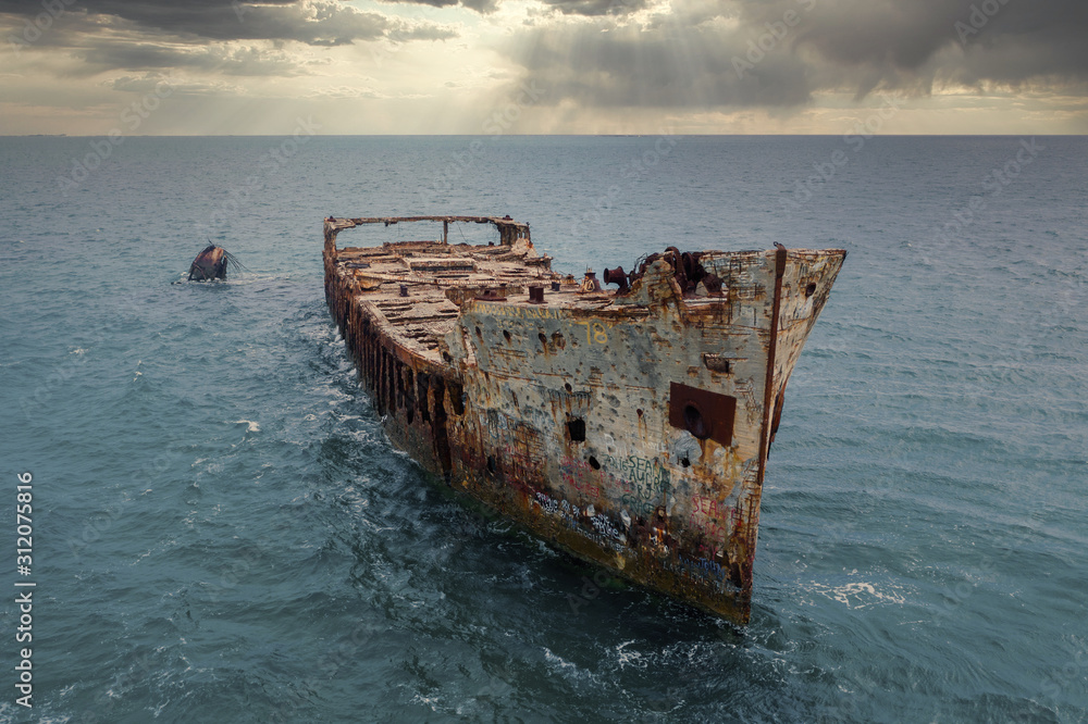 The infamous Sapona concrete ship sits wrecked in the shallow waters of the Caribbean Sea near the Bahamas The infamous Sapona concrete ship sits wrecked in the shallow waters of the Caribbean Sea near the Bahamas